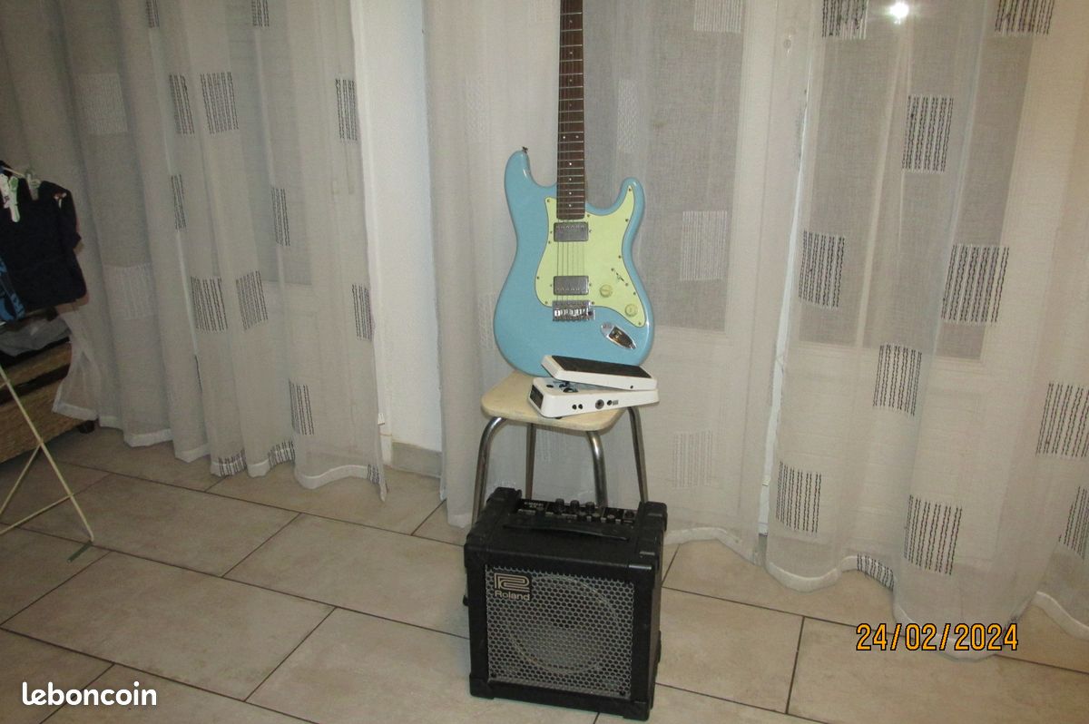 Guitare éléctrique + ampli roland cube (image 1)