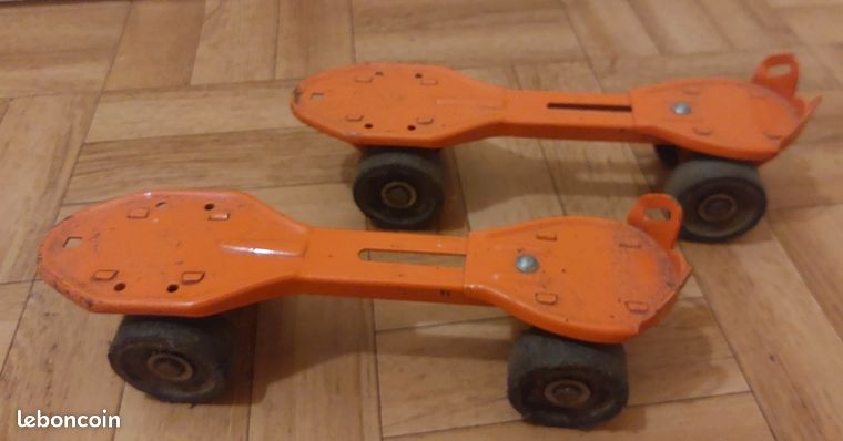 TOPModel Gomme patins à roulettes mauve et orange