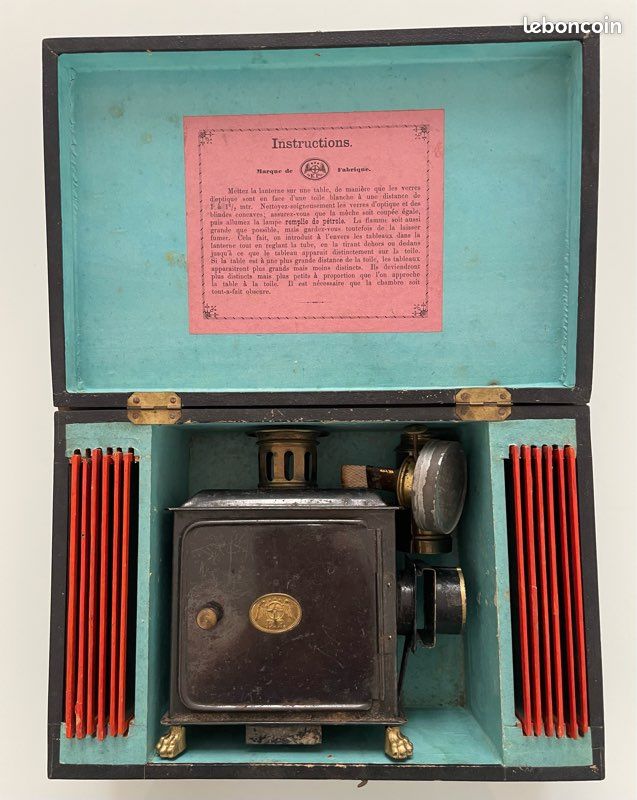Sold Price: [LANTERNE MAGIQUE]. Charmante petite lanterne magique en tôle peinte à pattes de