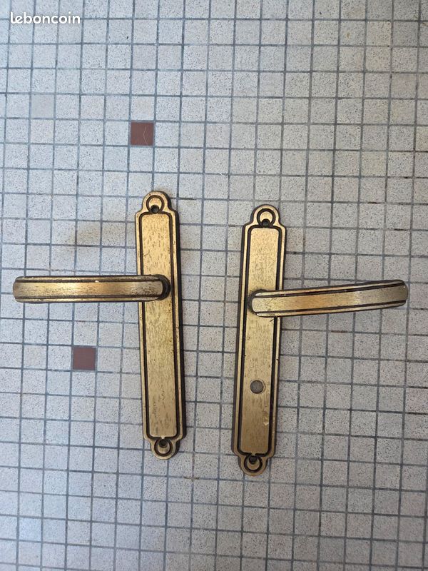 Poignées de porte en métal doré (image 1)