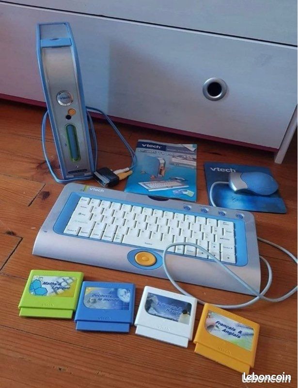 Ordinateur éducatif VTech + 4 cartouches – dès 6 ans TBE (image 1)