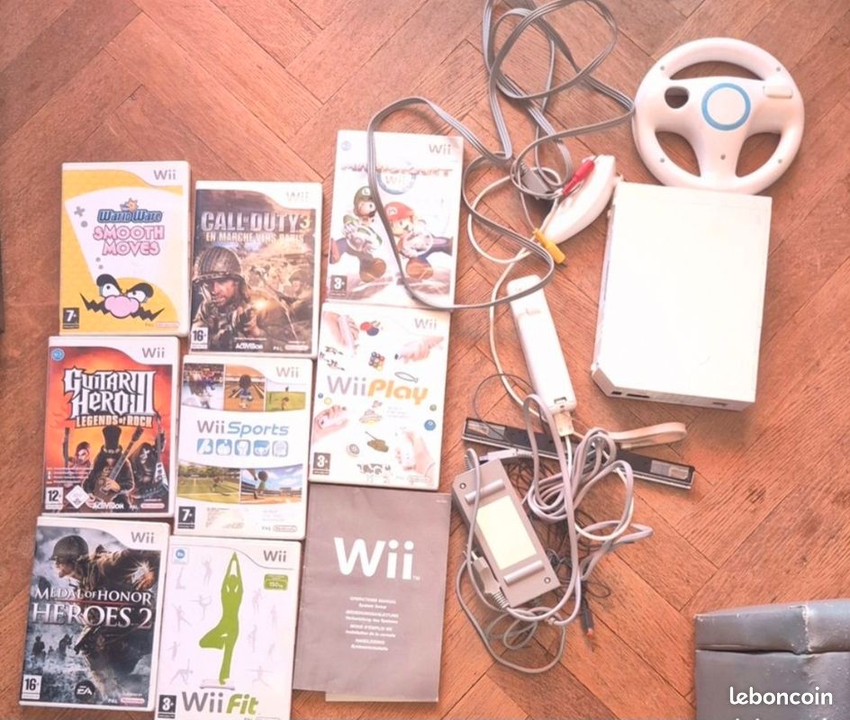 Wii + volant + mario kart + jeux+ balance (image 1)