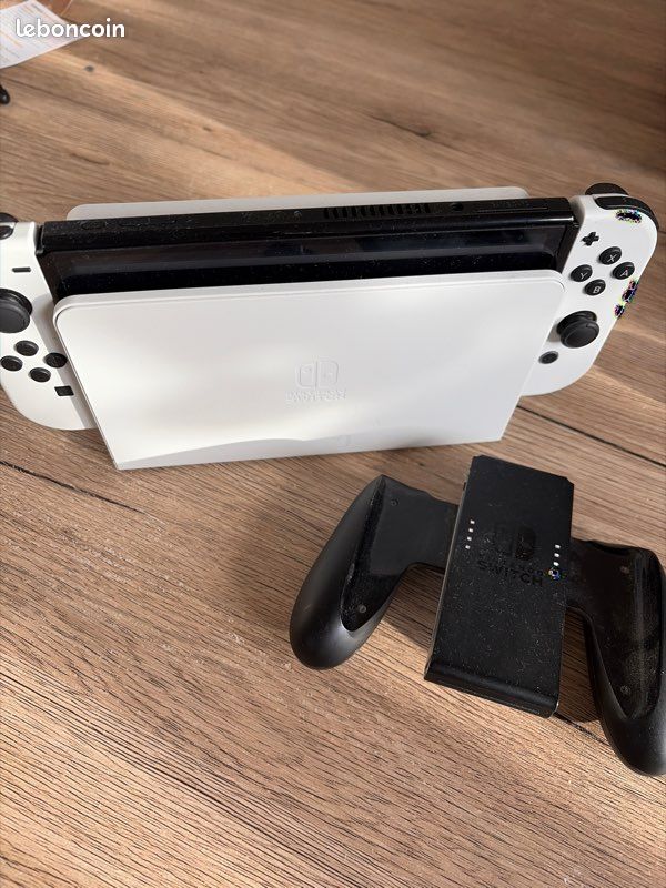 Nintendo switch oled comme neuve (image 1)