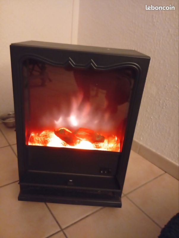 Poêle électrique décoratif ambiance chaleureuse (Gebraucht) in Charmey