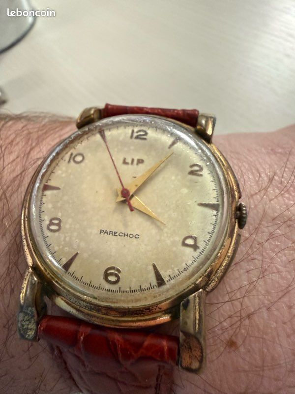Montre Mécanique Vintage LIP-ELGILOY Pare-Choc - Boîtier Acier, Cadran Blanc, Occasion Fonctionnelle