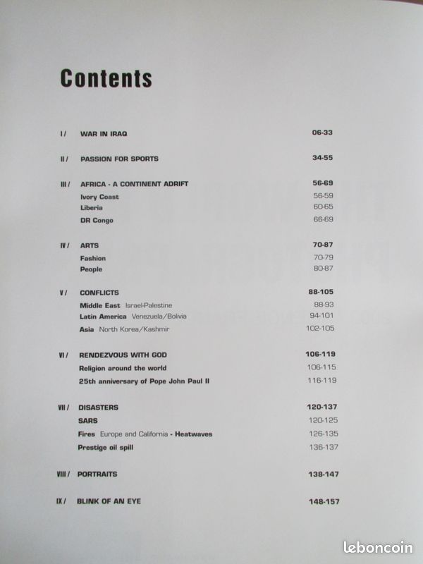 THE WORLD IN PHOTOGRAPHS AGENCE FRANCE PRESSE 2003 (ref biblio 6636) (image 2)