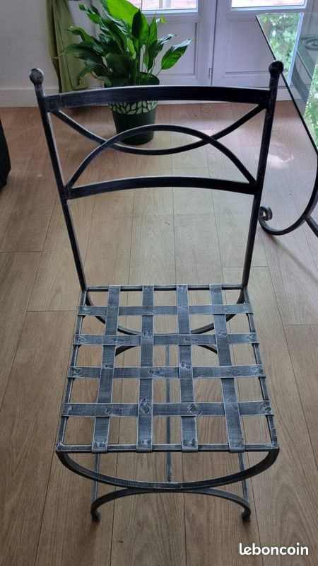 Table en verre et acier et ses quatre chaises (image 2)