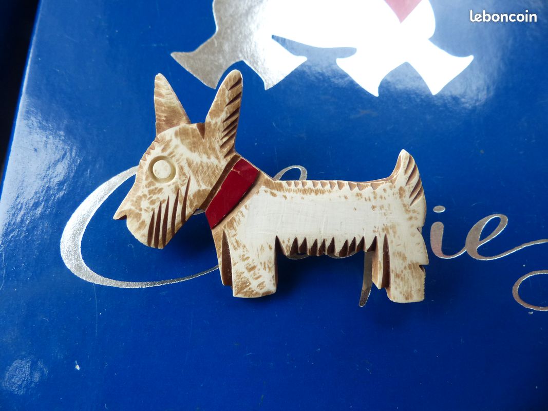 Broche chien Schnauzer Scottish Terrier argenté doré cristaux