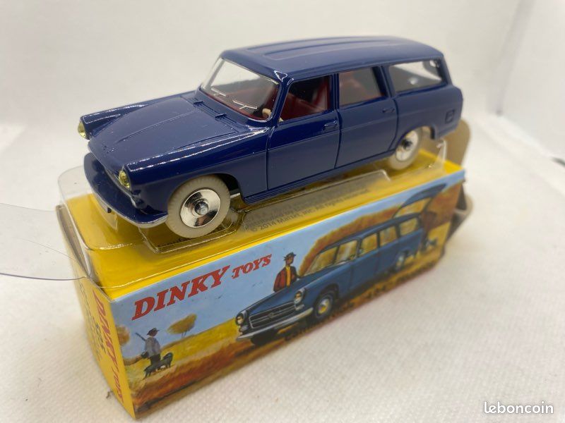 Dinky Toys Atlas Peugeot 404 commercial (image 1)