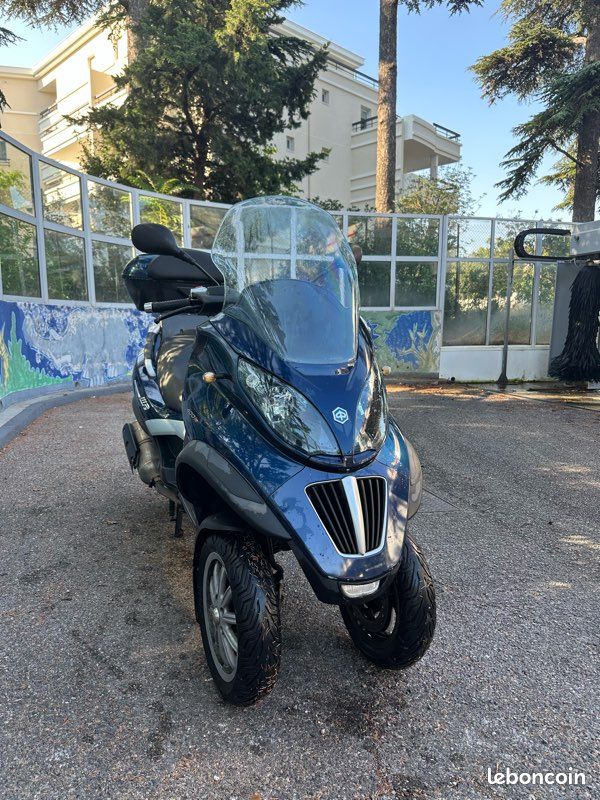 Piaggio MP3 400 LT IE – 2009 – Entretien suivi – Top case (image 1)