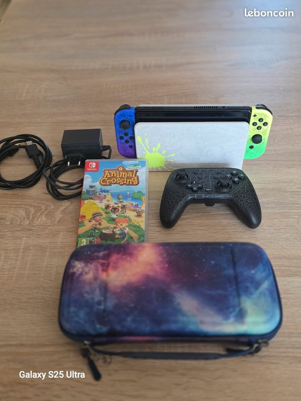 Console Switch oled édition splatoon 3. . Toute neuve. Jamais utilisée. . Avec animal crossing. Manette pour Switch. Trousse de transport et protection (image 1)