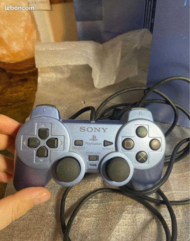console ps2 aqua-blue qui et fonctionnel+les câbles+une
