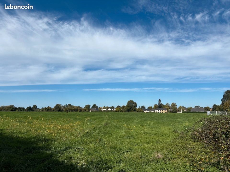 Terrain 606 m² · à Moyaux · 60 000 €