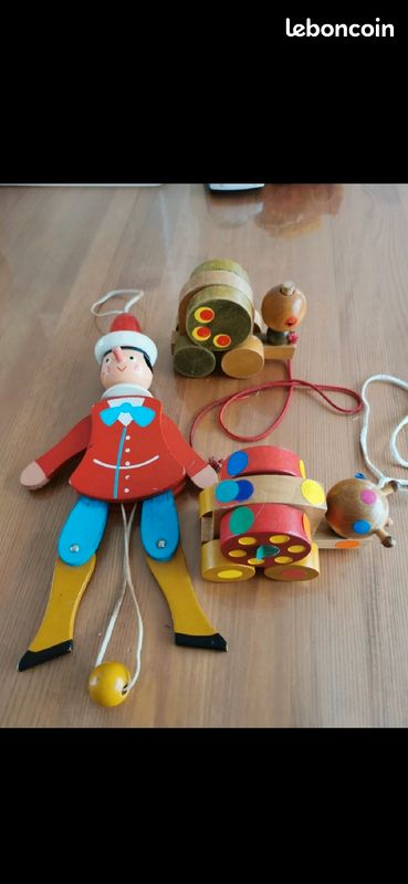 Jouet en bois Pinocchio et escargots (image 1)