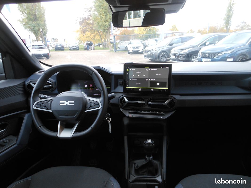 Dacia Duster 130 Ch TCE Mild Hybrid Expression BVM gris + sieges chauffant / NAV et garantie (image 8)