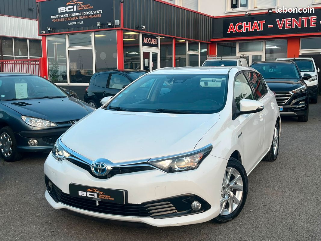 TOYOTA AURIS (2) Hybride 1.8 VVT-i HSD 136H DYNAMIC BUSINESS ( TVA Récupérable ✅- Boite Auto🕹️- Crit’air 1 🟣 - Garantie & Révisée ✅ ) (image 1)