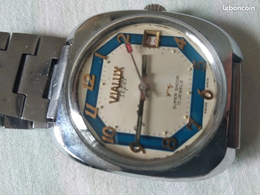 Montre suisse homme Vialux, acier, rare Montres Bijoux