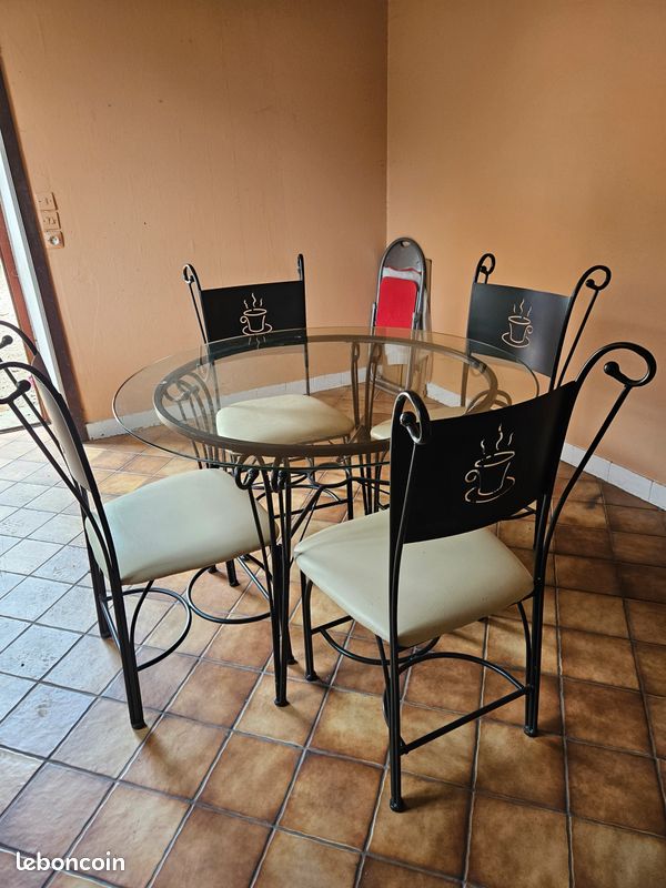 Table en verre avec 4 chaises (image 1)