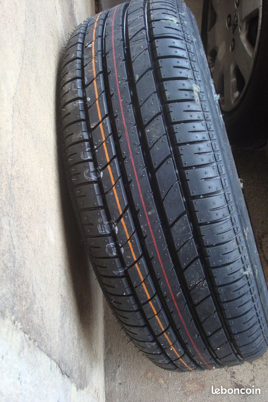 Roue de secoure 4 trous bridgestone R 16 (image 1)