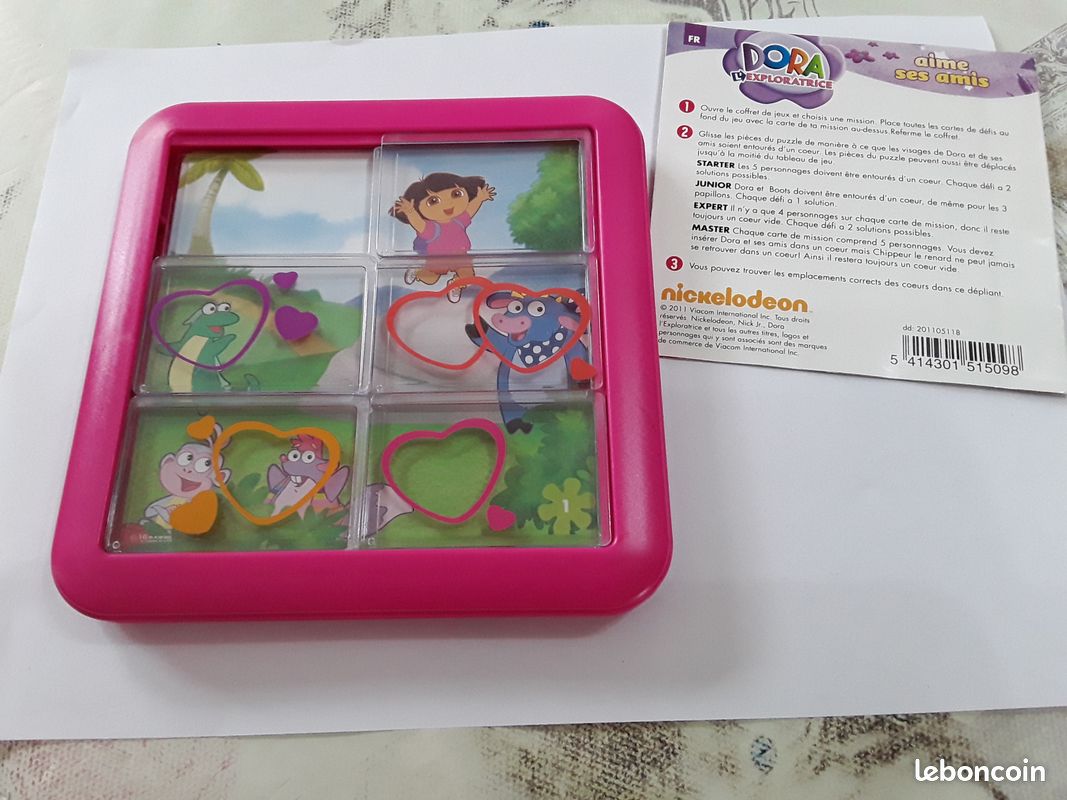 Dora - Boîte Métal 28 Dominos - Personnages Explorateurs - Jeu De Société - Jeu D'Équilibre Patience Raisonnement - Boîte Rangement Et Transport - Jouet Issu du Dessin Animé - Jouet Enfant 4 Ans et