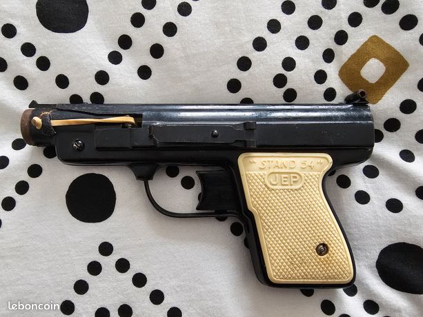 Le petit pistolet jouet à bouchons de FAJ en métal