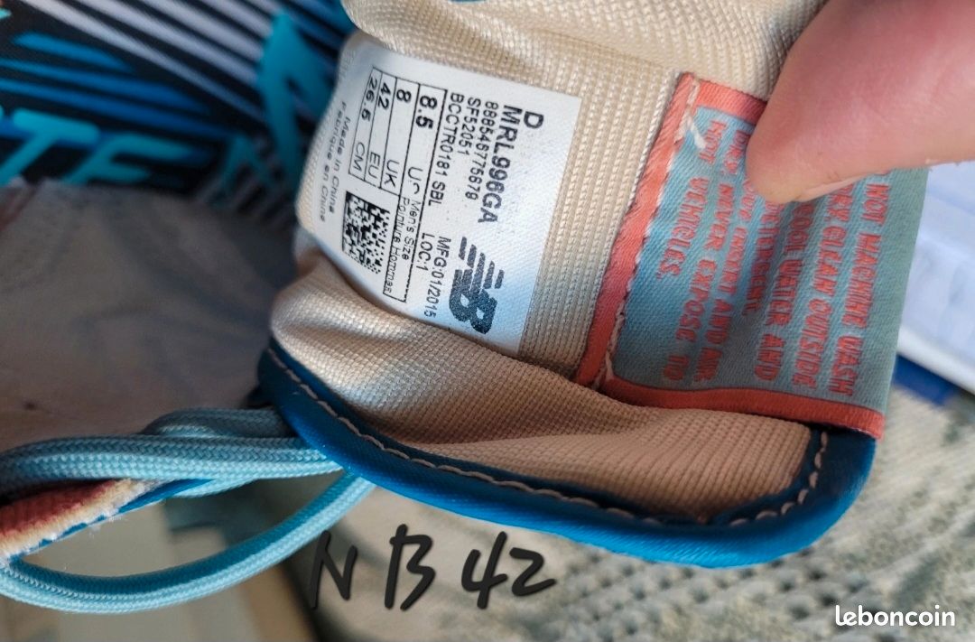 Baskets homme New balance bleu blanc orange plus lacets orange