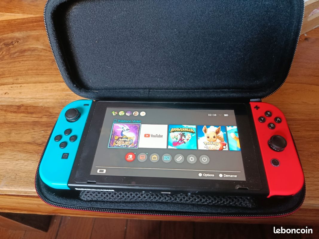 Pack Nintendo Switch + 2 Jeux (Animal Crossing, Mario Strikers...) + Housse & Chargeur (image 1)