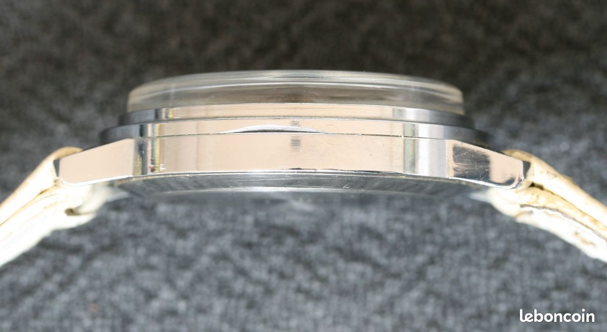 Raketa Copernic vintage Montre mécanique russe Cadran blanc et doré (image 6)