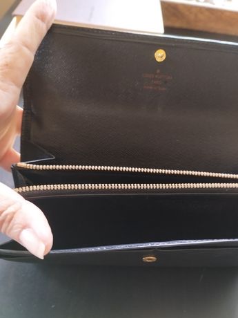 Porte monnaie Louis Vuitton, original en cuir noir