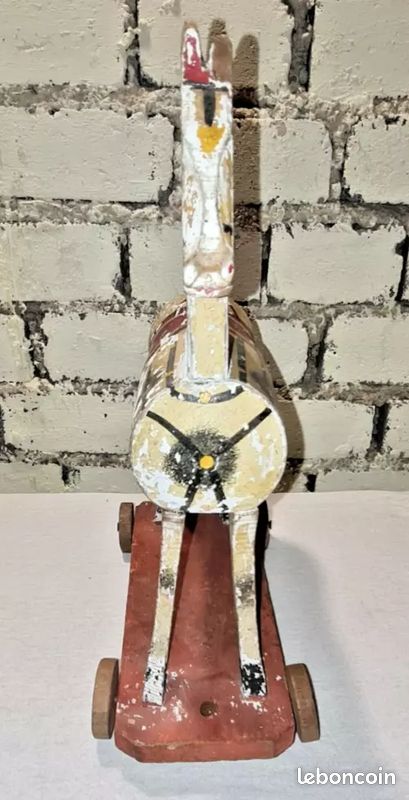 Rêveries et Bois Cheval en bois retro à roulettes
