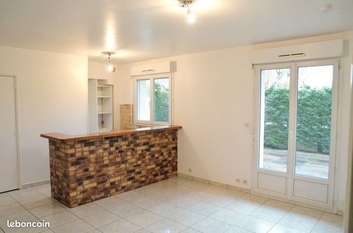 Appartement avec rez de jardin + box fermé et 1 place de parking