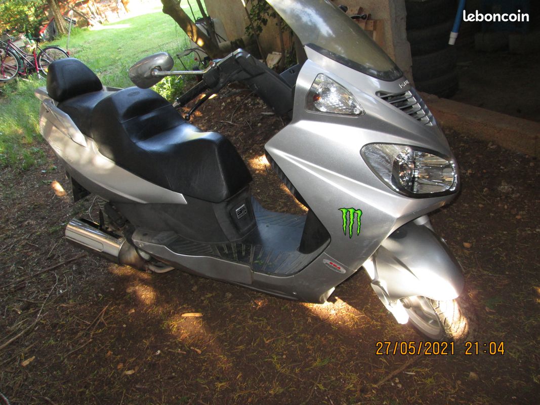 échange scooter 125 daelim contre quad (image 1)