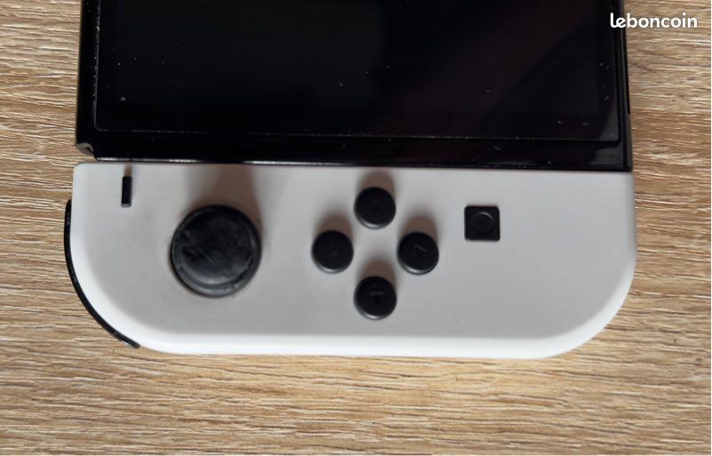 Nintendo Switch OLED blanche + 4 jeux + Joy-Con supplémentaires (image 4)