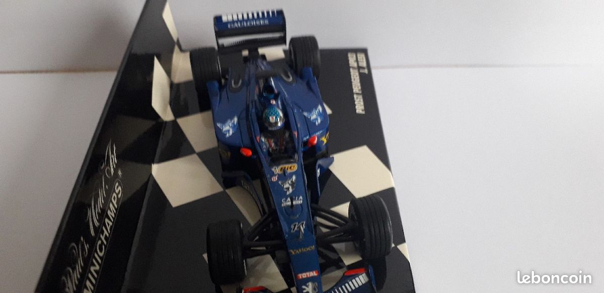 Miniature F1 Minichamps 1/43 – Prost Peugeot AP03 – Nick Heidfeld – Collection