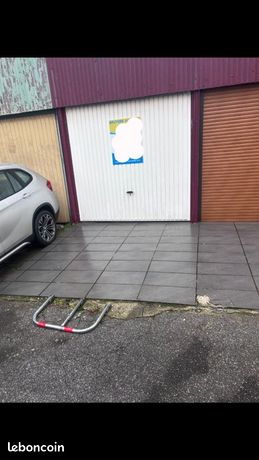 Garage + 1 place privée