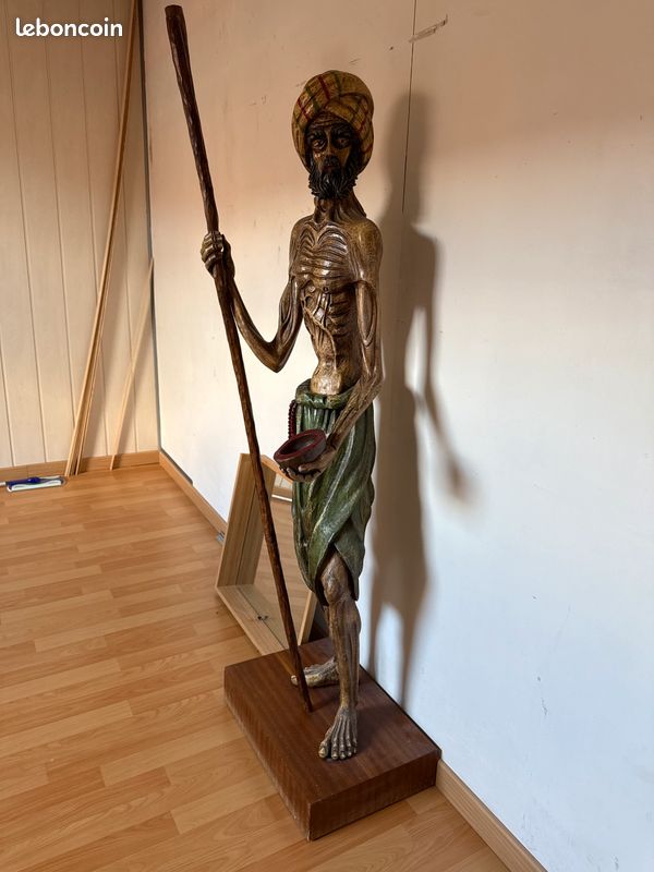 Statut en bois (image 1)