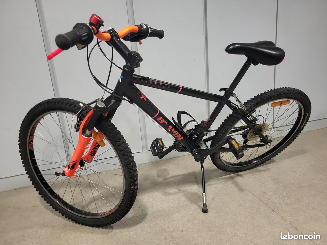 Vtt rockrider 500 24 pouces noir et orange très propre 9-12 ans
