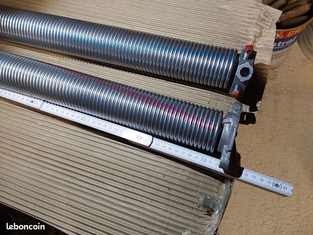 Comment changer ressort porte de garage basculante | Guide pratique
