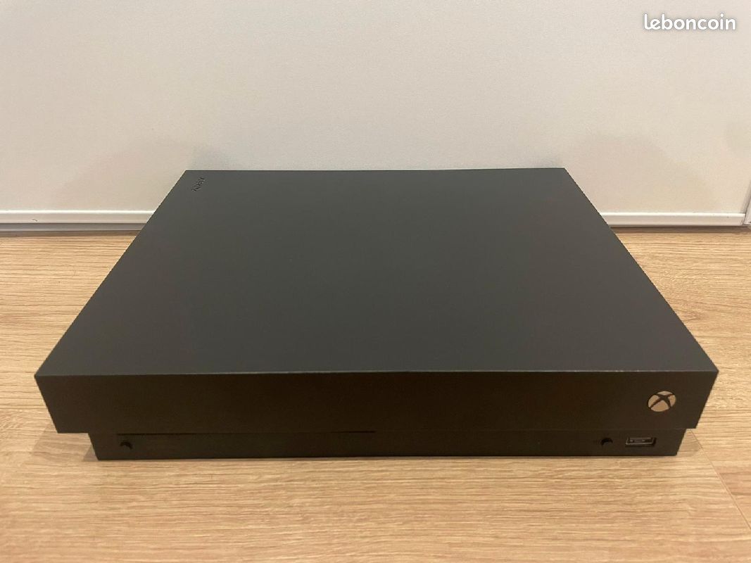 Xbox one x + manette + 2 jeux (image 4)