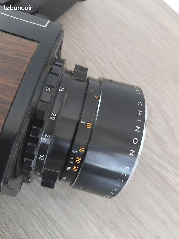 1970s cine camera sold by Dixons. Chinon 674 macro power zoom synchro sound Super 8 movie camera. On a white background Stock Photo