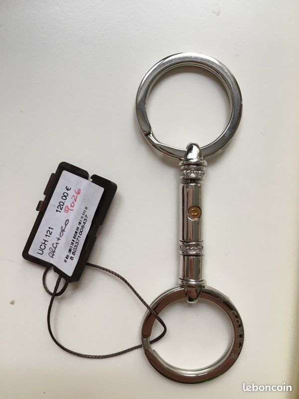 Porte cles argent et or neuf (image 1)