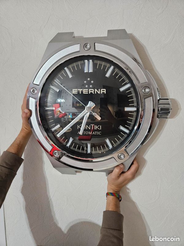 Horloge Murale Eterna Kontiki, Noire, Métal/plastique, état Correct