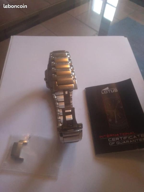 Belle montre LOTUS acier (image 3)