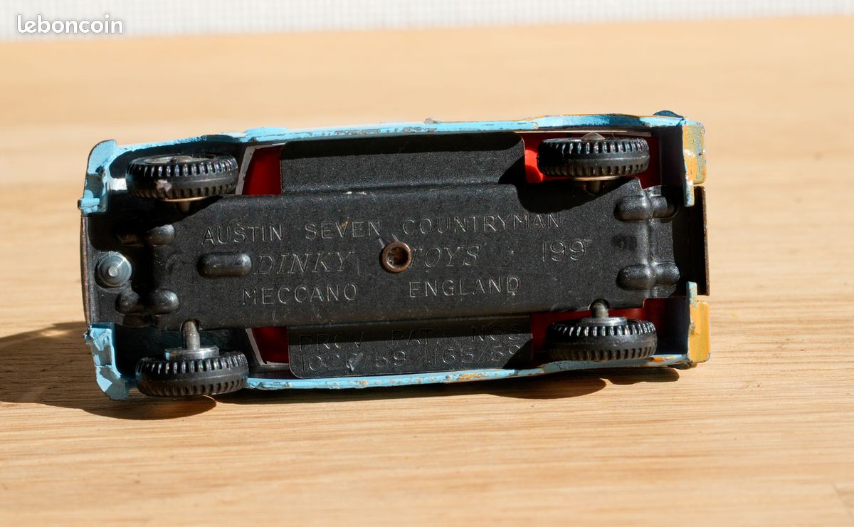 A boxed Dinky Toys No.199 blue Austin Seven Countryman with red interior