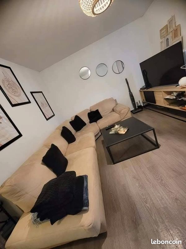 Canapé beige (image 1)