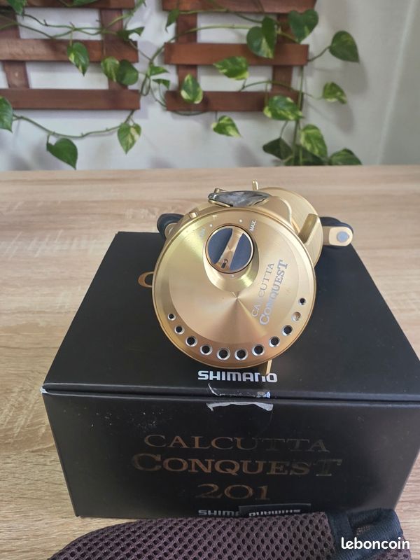 Moulinet De Lancer Shimano Calcutta Conquest 100 - Poignée Droite - Occasion Bon état - Fabriqué Au Japon