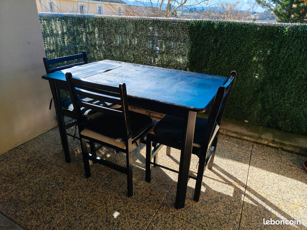 Table de salle à manger en bois noir peint (image 1)