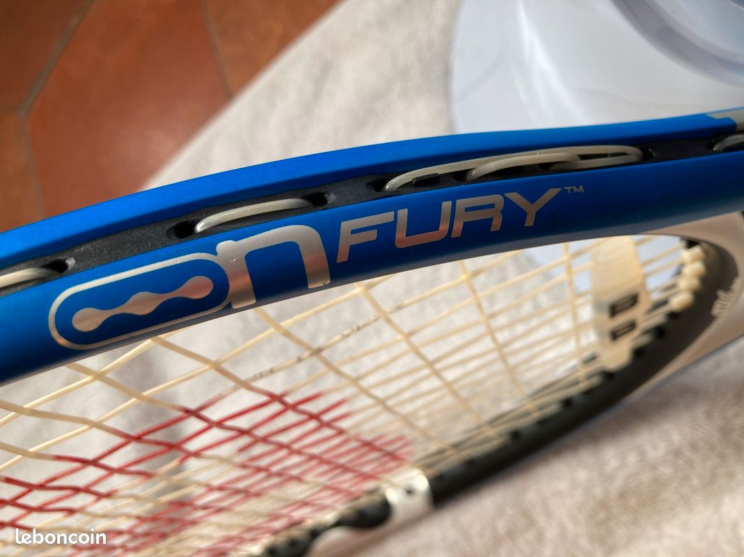 Raquette Tennis Wilson Fury 4 Hybrid - Surdimensionnée 110in² - Manche 4 1/4