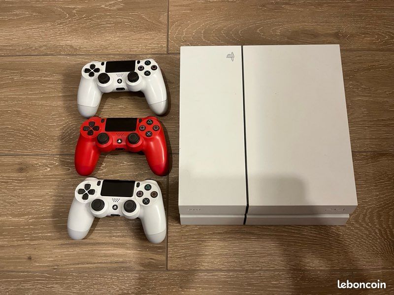 Console PS4 slim blanche + 15 jeux (image 1)
