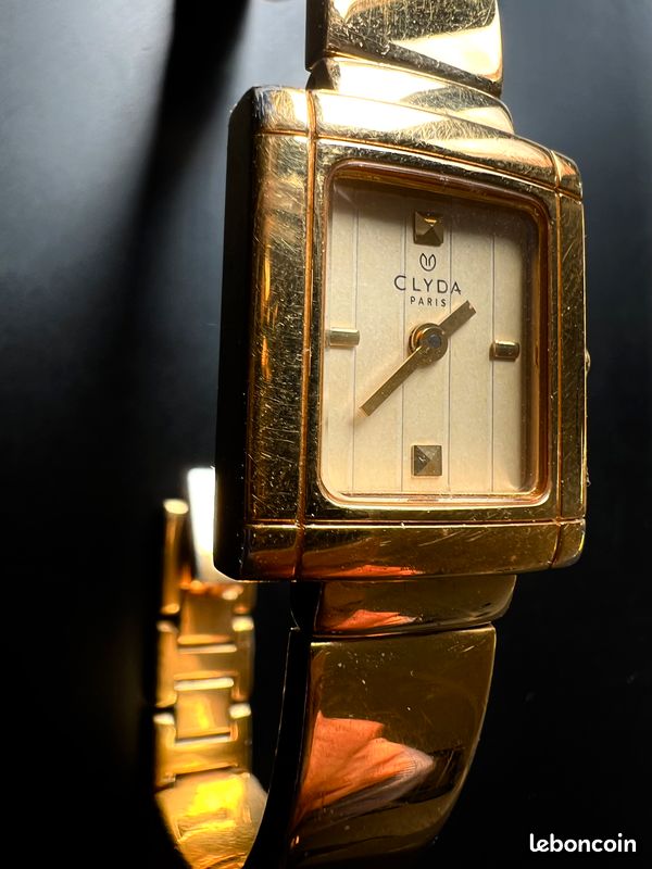 Montre CLYDA 23K gold plaqué or fonctionne Montres Bijoux